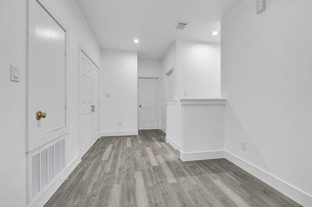 2332 Wavell St, Houston, TX 77088 - hallway with recessed lighting and wood finished floors