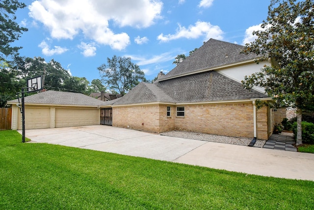 12903 Cluster Pine Dr, Cypress, TX 77429 - rear view of house featuring brick siding and a shingled roof
