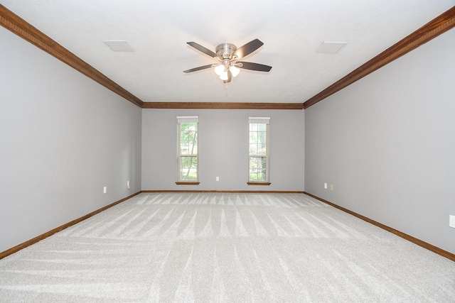 12903 Cluster Pine Dr, Cypress, TX 77429 - empty room featuring crown molding, ceiling fan, and light carpet