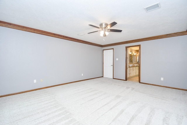 12903 Cluster Pine Dr, Cypress, TX 77429 - unfurnished bedroom with light colored carpet, crown molding, ceiling fan, and ensuite bath