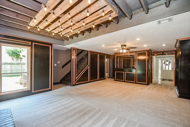 12903 Cluster Pine Dr, Cypress, TX 77429 - unfurnished living room with stairway, light colored carpet, healthy amount of natural light, and recessed lighting