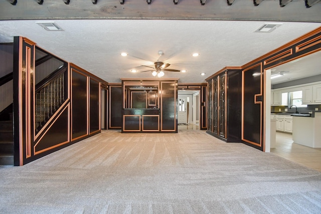 12903 Cluster Pine Dr, Cypress, TX 77429 - unfurnished living room featuring light carpet, a ceiling fan, recessed lighting, and light tile patterned floors