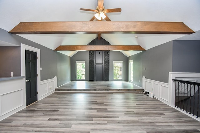 12903 Cluster Pine Dr, Cypress, TX 77429 - foyer with a decorative wall, wood finished floors, a ceiling fan, and a wainscoted wall