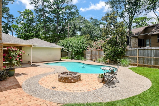 12903 Cluster Pine Dr, Cypress, TX 77429 - view of pool featuring a patio, an outdoor fire pit, and a fenced backyard