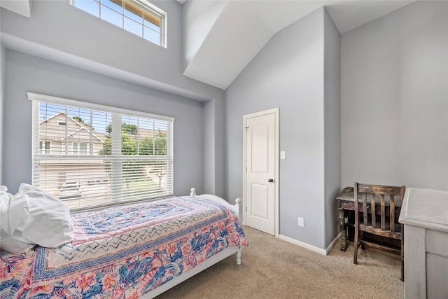 122 Cheswood Forest Dr, Montgomery, TX 77316 - carpeted bedroom featuring multiple windows and high vaulted ceiling