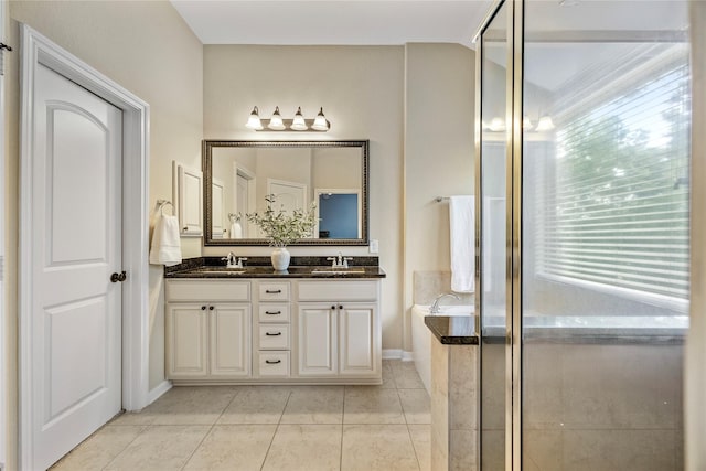 122 Cheswood Forest Dr, Montgomery, TX 77316 - full bathroom with double vanity, a bath, tile patterned flooring, and an enclosed shower