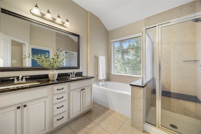 122 Cheswood Forest Dr, Montgomery, TX 77316 - full bath featuring double vanity, a stall shower, lofted ceiling, a garden tub, and tile patterned flooring
