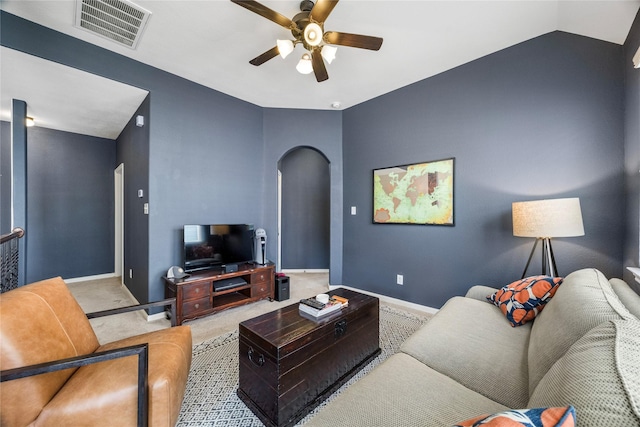 122 Cheswood Forest Dr, Montgomery, TX 77316 - carpeted living room with arched walkways and a ceiling fan