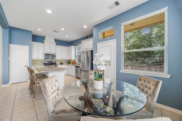 122 Cheswood Forest Dr, Montgomery, TX 77316 - dining room featuring light tile patterned flooring and recessed lighting