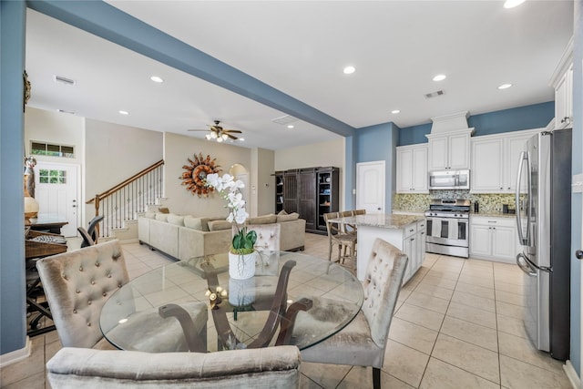 122 Cheswood Forest Dr, Montgomery, TX 77316 - dining room featuring stairs, light tile patterned floors, recessed lighting, and ceiling fan