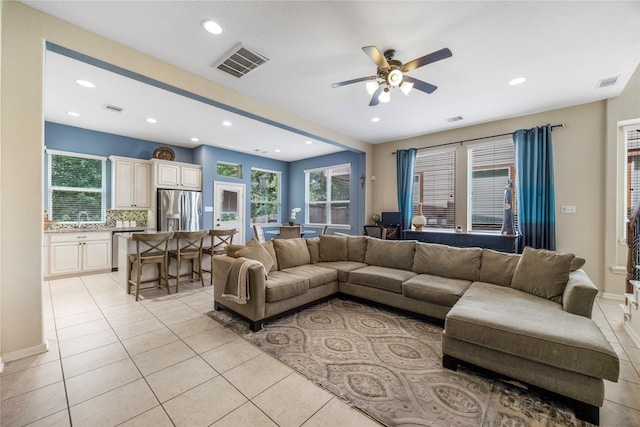 122 Cheswood Forest Dr, Montgomery, TX 77316 - living area featuring light tile patterned floors, a ceiling fan, and recessed lighting