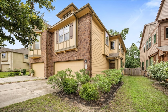 122 Cheswood Forest Dr, Montgomery, TX 77316 - view of front of house featuring a garage, brick siding, and concrete driveway