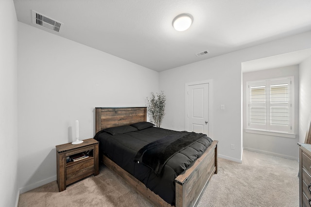15610 Scolty Reach Ln, Humble, TX 77346 - bedroom featuring light colored carpet and baseboards