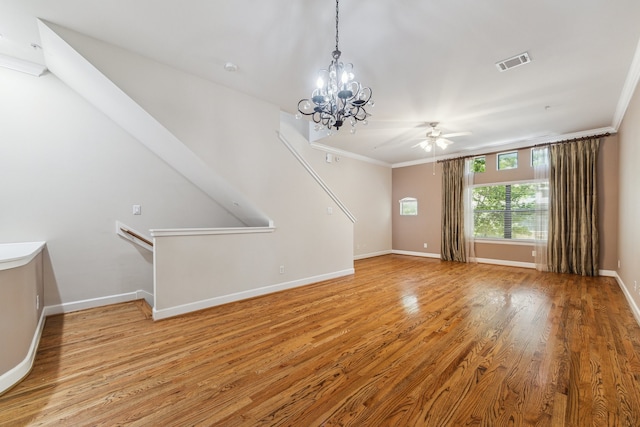 11315 S Main St Unit 1205, Houston, TX 77025 - unfurnished living room with a chandelier, a ceiling fan, light wood finished floors, and crown molding