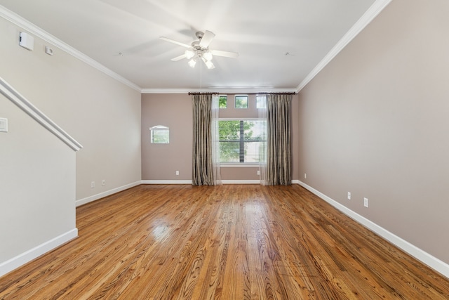11315 S Main St Unit 1205, Houston, TX 77025 - spare room with crown molding, a ceiling fan, and light wood-style flooring