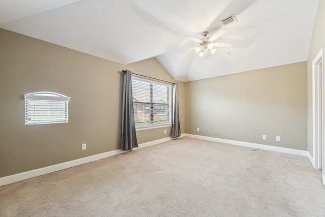 11315 S Main St Unit 1205, Houston, TX 77025 - spare room featuring lofted ceiling, ceiling fan, and light colored carpet