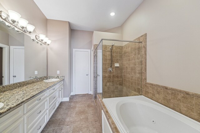 11315 S Main St Unit 1205, Houston, TX 77025 - full bath with a whirlpool tub, a shower stall, and double vanity