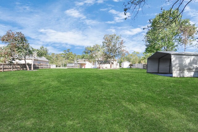 1019 N Country Club Dr, La Porte, TX 77571 - view of yard with a detached carport