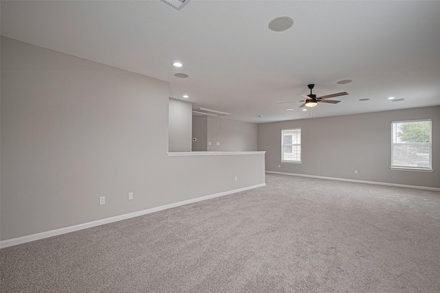 6723 Green Pear Ln, Houston, TX 77049 - spare room featuring attic access, plenty of natural light, ceiling fan, carpet, and recessed lighting