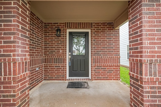 6723 Green Pear Ln, Houston, TX 77049 - entrance to property featuring covered porch and brick siding