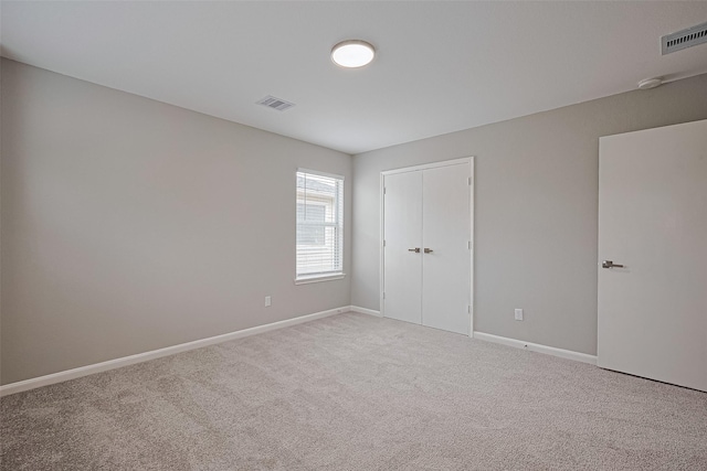 6723 Green Pear Ln, Houston, TX 77049 - unfurnished bedroom with carpet and a closet