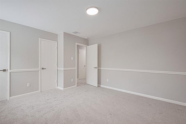 6723 Green Pear Ln, Houston, TX 77049 - unfurnished bedroom with carpet and baseboards