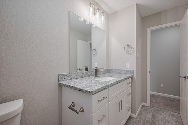 6723 Green Pear Ln, Houston, TX 77049 - bathroom featuring vanity and marble look tiles