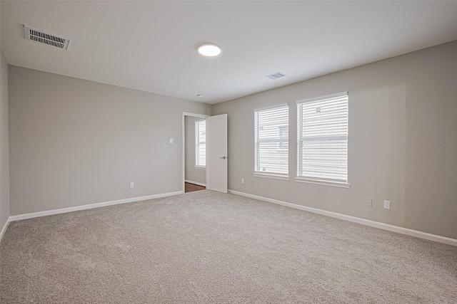 6723 Green Pear Ln, Houston, TX 77049 - spare room with baseboards and carpet flooring