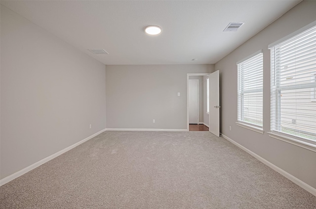 6723 Green Pear Ln, Houston, TX 77049 - empty room featuring light colored carpet