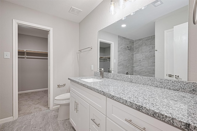 6723 Green Pear Ln, Houston, TX 77049 - full bath with vanity, a spacious closet, and tiled shower