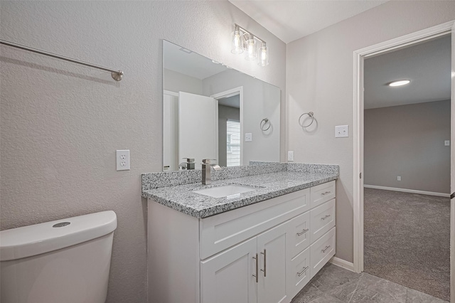 6723 Green Pear Ln, Houston, TX 77049 - bathroom with vanity and a textured wall