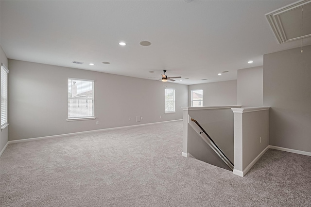 6723 Green Pear Ln, Houston, TX 77049 - empty room featuring attic access, light carpet, healthy amount of natural light, and recessed lighting
