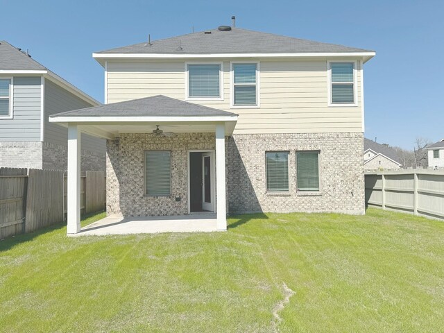 10654 Whitejacket, Conroe, TX 77385 - back of house featuring a patio, a ceiling fan, and brick siding