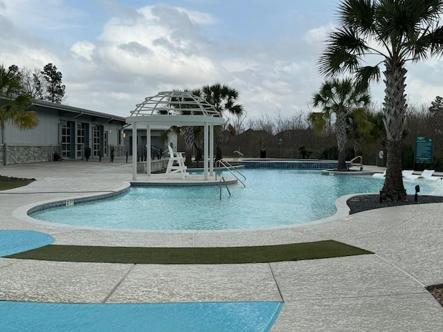 10654 Whitejacket, Conroe, TX 77385 - community pool with a patio area and a gazebo