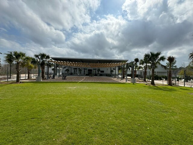 10654 Whitejacket, Conroe, TX 77385 - view of home's community with a lawn and a pergola