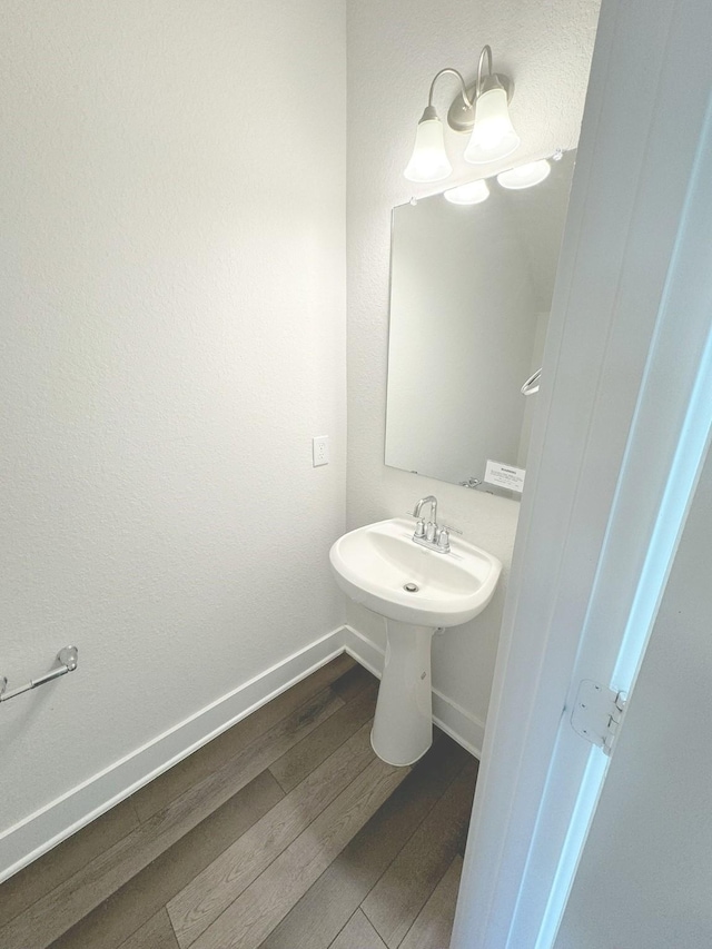 10654 Whitejacket, Conroe, TX 77385 - bathroom featuring wood finished floors and baseboards