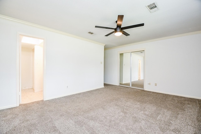 5651 Wigton Dr, Houston, TX 77096 - carpeted spare room featuring crown molding, a ceiling fan, and baseboards