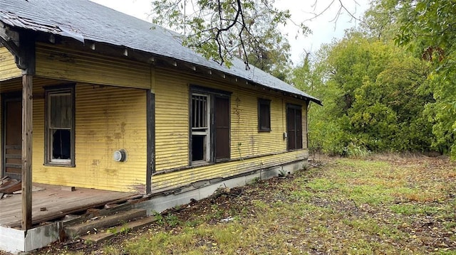 502 W 10th St, Coleman, TX 76834 - view of home's exterior with a wooden deck