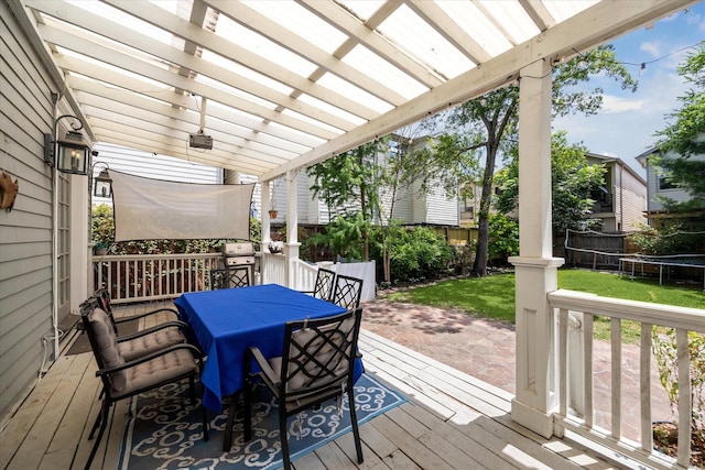 2408 Beall St, Houston, TX 77008 - wooden terrace with a trampoline, outdoor dining area, a fenced backyard, a pergola, and area for grilling