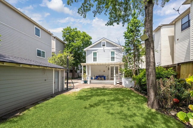 2408 Beall St, Houston, TX 77008 - rear view of house with a patio area