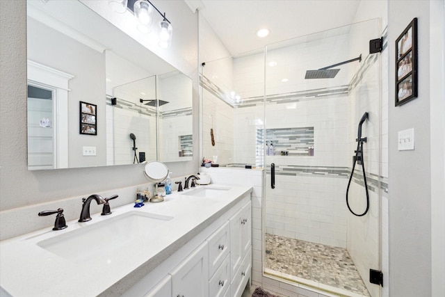 2408 Beall St, Houston, TX 77008 - full bathroom with a stall shower, double vanity, and recessed lighting