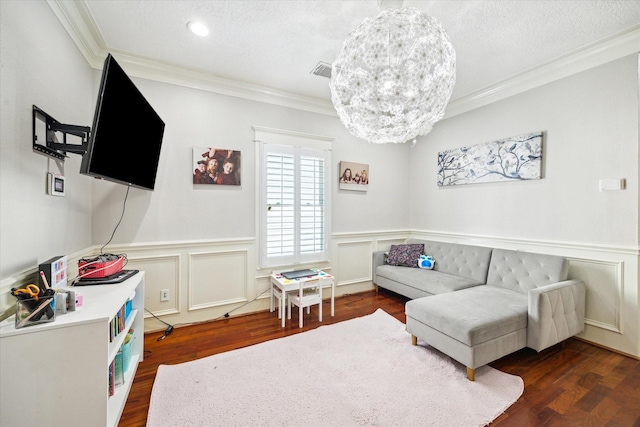 2408 Beall St, Houston, TX 77008 - living area featuring ornamental molding, dark wood-style flooring, a wainscoted wall, and recessed lighting