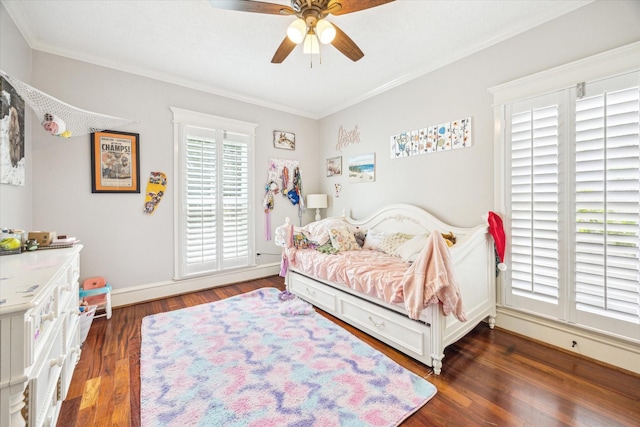 2408 Beall St, Houston, TX 77008 - bedroom featuring ornamental molding, dark wood-type flooring, and ceiling fan