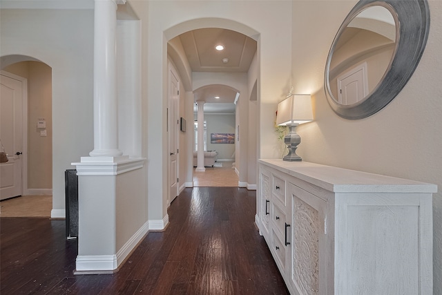 28210 Green Forest Bluff Trl, Katy, TX 77494 - hall with dark wood finished floors, arched walkways, and recessed lighting