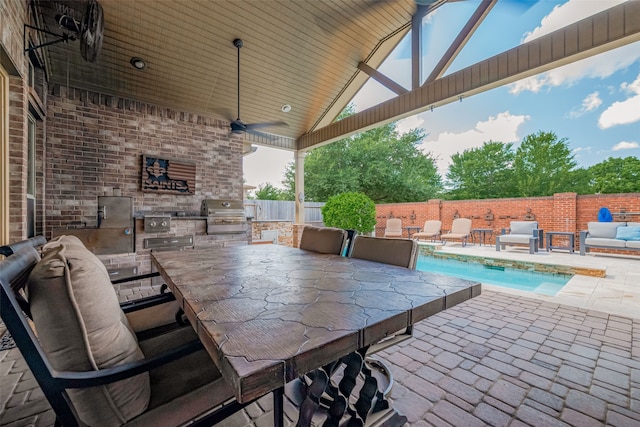 28210 Green Forest Bluff Trl, Katy, TX 77494 - view of patio with an outdoor kitchen and a ceiling fan