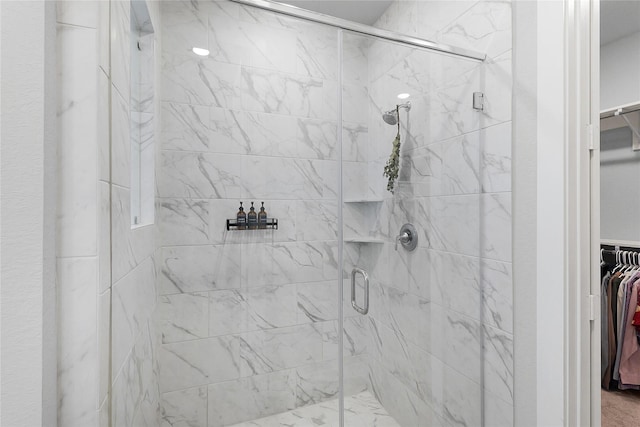 5122 Walnut Grove Ln, Manvel, TX 77578 - bathroom featuring a walk in closet and a shower stall