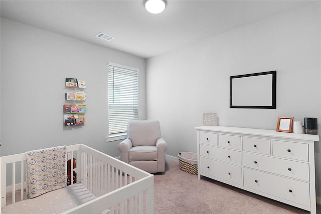 5122 Walnut Grove Ln, Manvel, TX 77578 - bedroom with light colored carpet and a crib