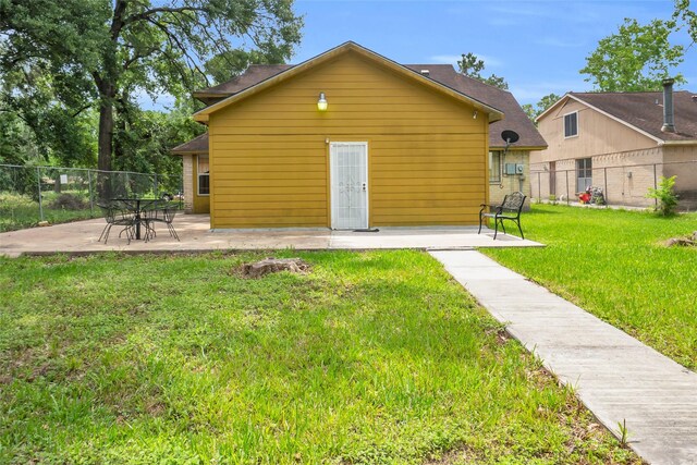 6803 Lakemont Dr, Houston, TX 77050 - rear view of house featuring a patio
