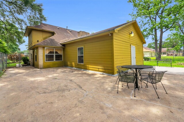 6803 Lakemont Dr, Houston, TX 77050 - rear view of house featuring a patio area