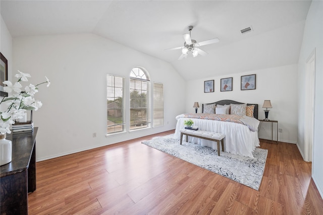 13814 Fort Nelson Dr, Houston, TX 77083 - bedroom with vaulted ceiling, wood finished floors, a ceiling fan, and baseboards